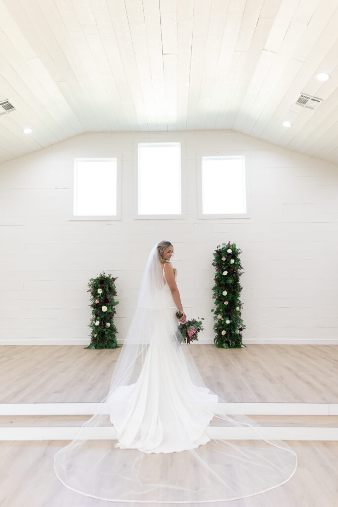 Bride portrait with cathedral veil indoor chapel at hummingbird hill tx taken by cecilly elaine photography
