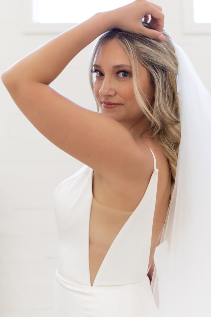 Bridal portrait indoors dramatic arms hummingbird hill tx chapel taken by cecilly elaine photography