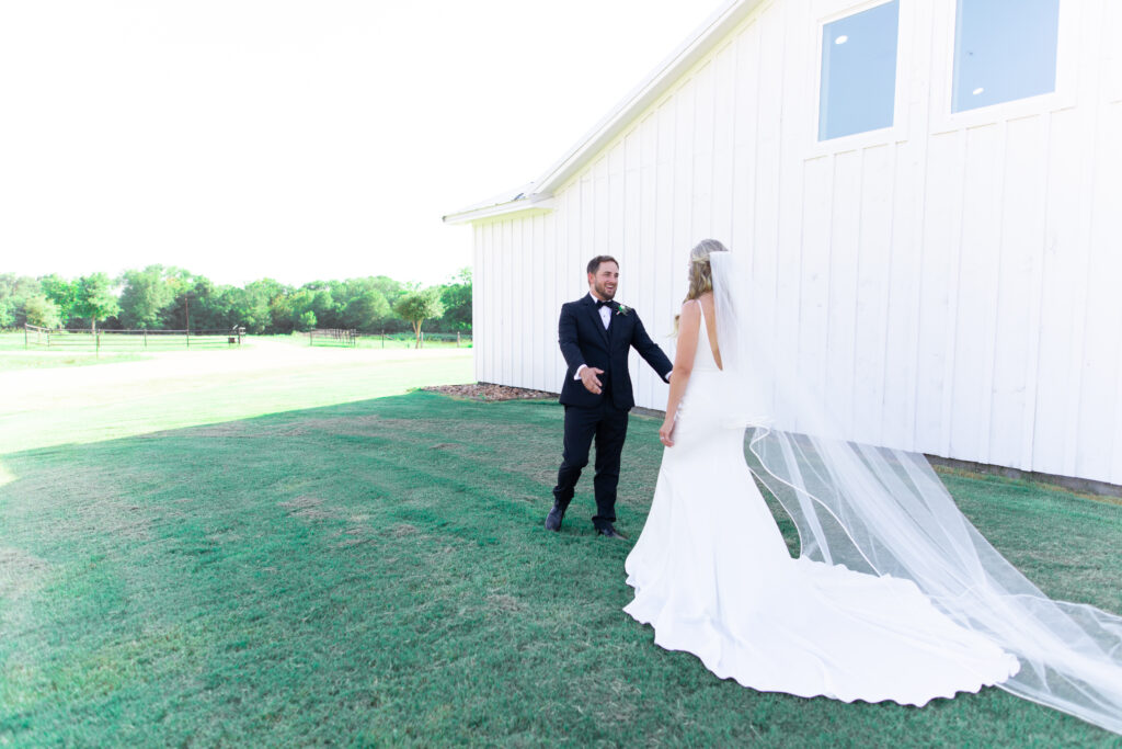 First look photos of bride and groom at hummingbird hill tx taken by cecilly elaine photography