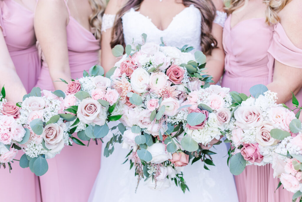 Bride and bridesmaids pink and white floral bouquets by cecilly elaine photography